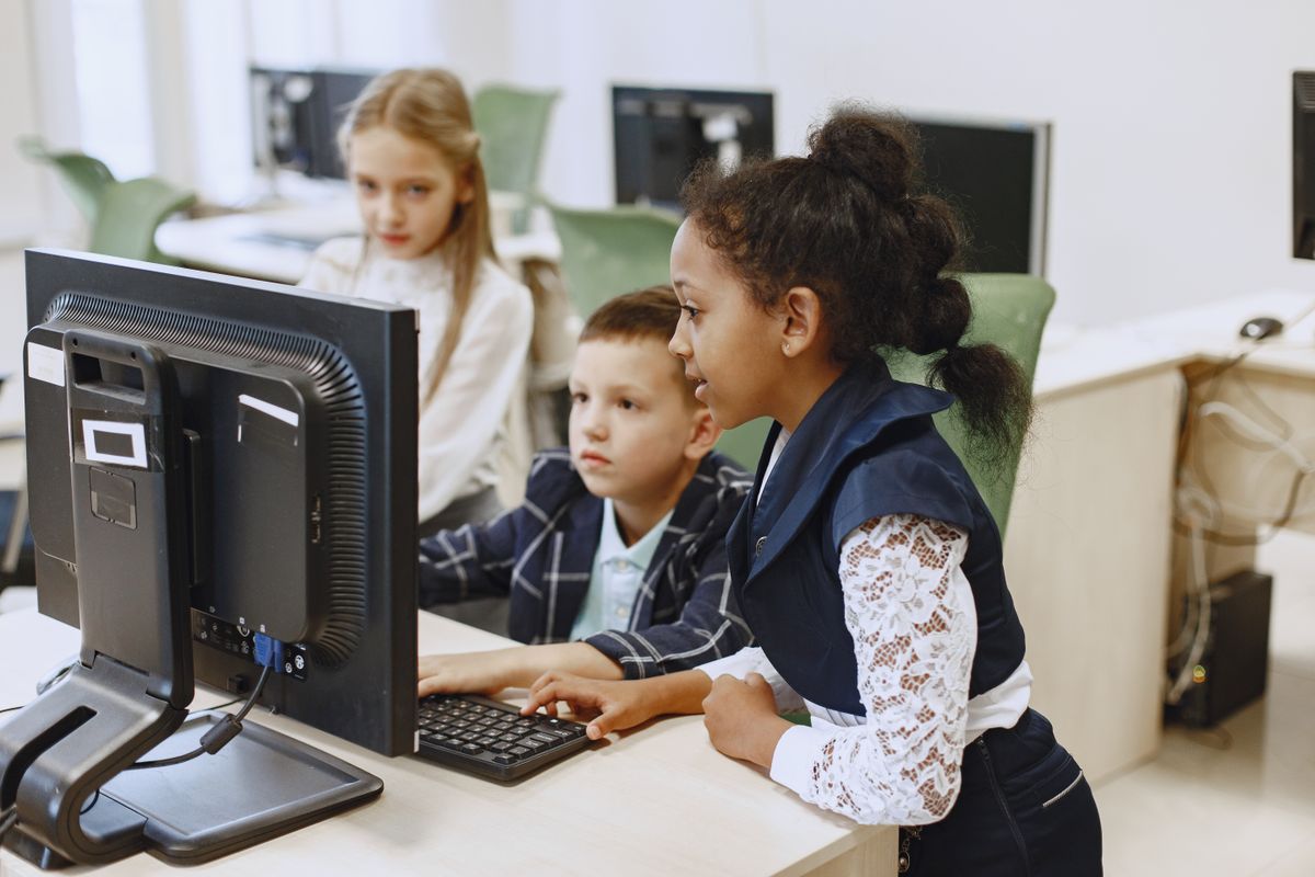 Children using a computer together
